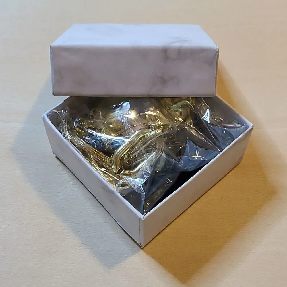 Tyrannosaurus gold pendant keychain